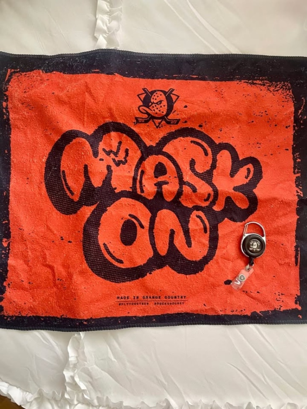 Anaheim Ducks Playoff Towel + Ducks Badge Reel Bundle